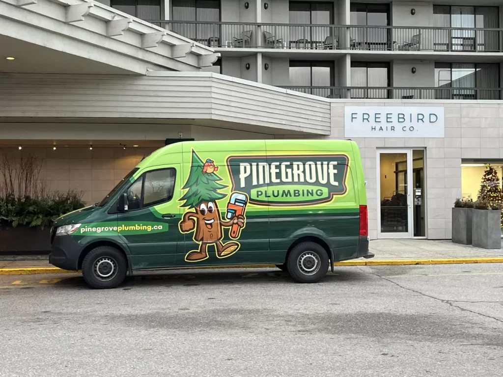 Pinegrove van next to an open store