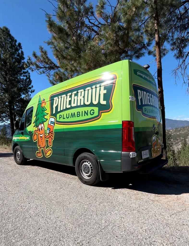 Pinegrove Plumbing van parked under a sunny sky