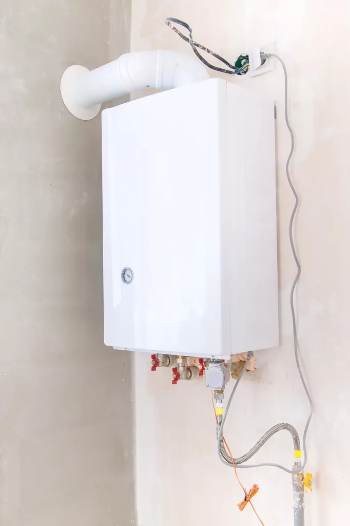 Tankless water heater on wall